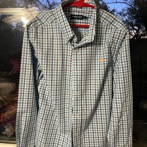 Like new long sleeved button down shirt for boys.